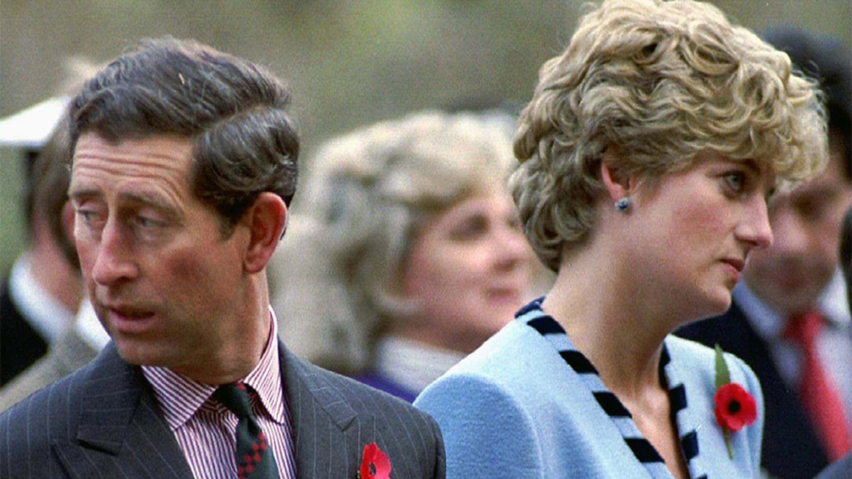 NOV92 FILE PHOTO - Princess Diana and Prince Charles look in different directions during a Korean War commemorative service in November 1992. Princess Diana, who was divorced from Charles in 1996, and her millionaire companion Dodi Al Fayed were killed early Sunday when their car crashed while reportedly being chased through Paris by photographers on motorcycles.FRANCE DIANA - RP1DRIDWLCAA