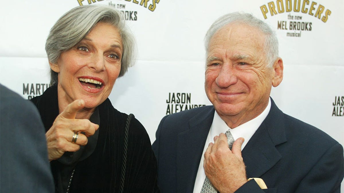 Actor Mel Brooks and wife, actress Anne Bancroft arrive for opening
night of the musical he created, 