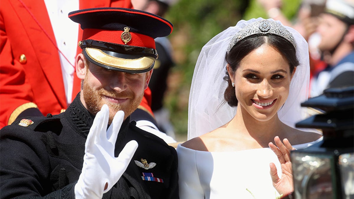 Prince Harry, Duke of Sussex and Meghan, Duchess of Sussex leave Windsor Castle in the Ascot Landau carriage during a procession after getting married at St Georges Chapel on May 19, 2018 in Windsor, England. Prince Henry Charles Albert David of Wales marries Ms. Meghan Markle in a service at St George's Chapel inside the grounds of Windsor Castle. Among the guests were 2200 members of the public, the royal family and Ms. Markle's Mother Doria Ragland. Chris Jackson/Pool via REUTERS - RC1D2E321900