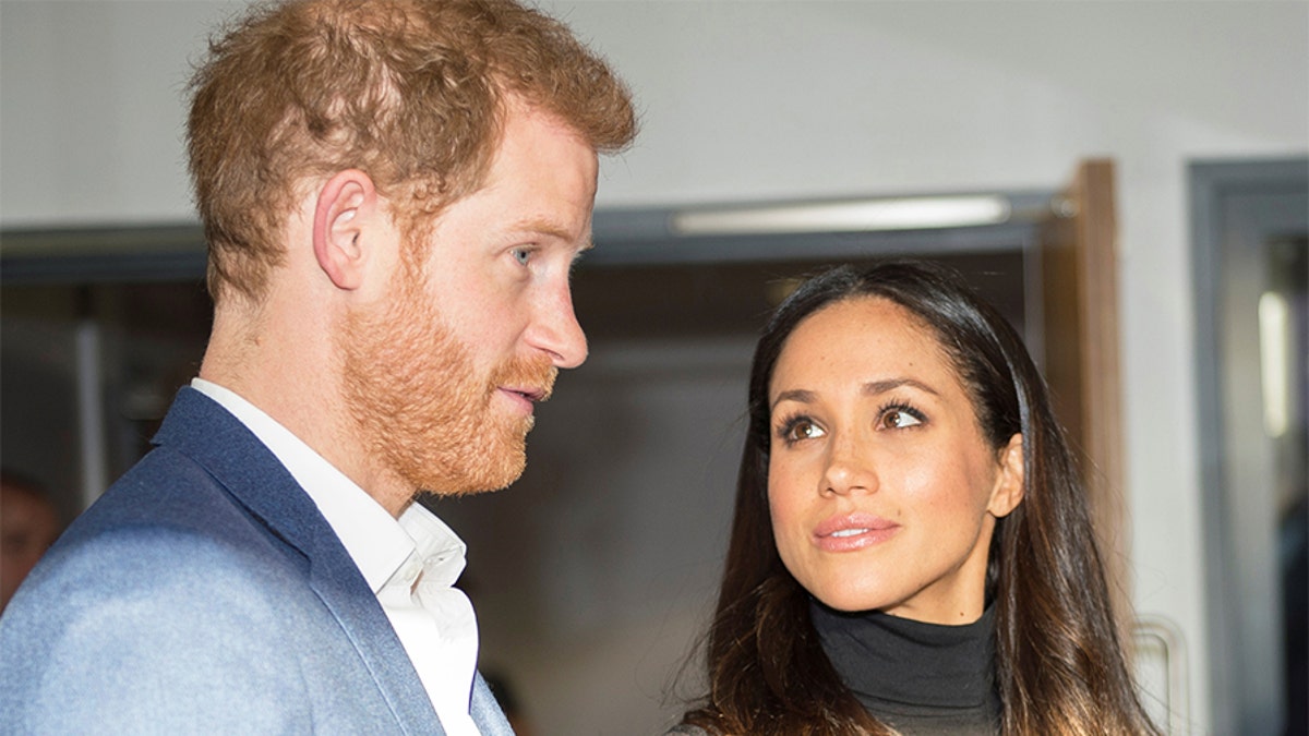 Britain's Prince Harry and his fiancee Meghan Markle visit the Nottingham Academy school in Nottingham, Britain, December 1, 2017. REUTERS/Andy Stenning/Pool - RC1A58AC09F0