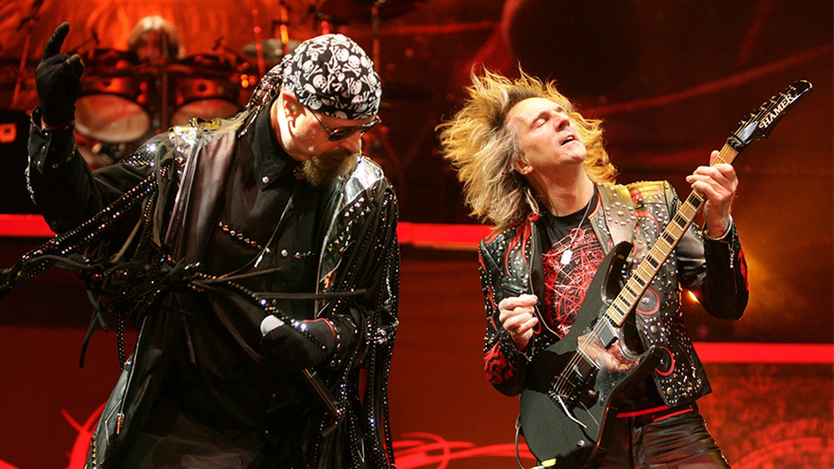 Singer Rob Halford (L) and guitarist Glenn Tipton of British metal band Judas Priest perform on stage at Globen Arena in Stockholm February 28, 2009. REUTERS/Fredrik Persson/Scanpix Sweden (SWEDEN)       NO COMMERCIAL SALES.  SWEDEN OUT. NO COMMERCIAL OR EDITORIAL SALES IN SWEDEN. NO COMMERCIAL OR BOOK SALES. - GM1E5310GTC02