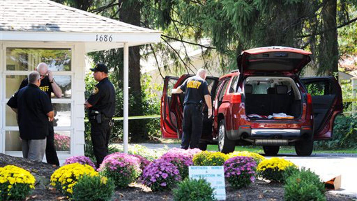 Real Estate Agents Slain