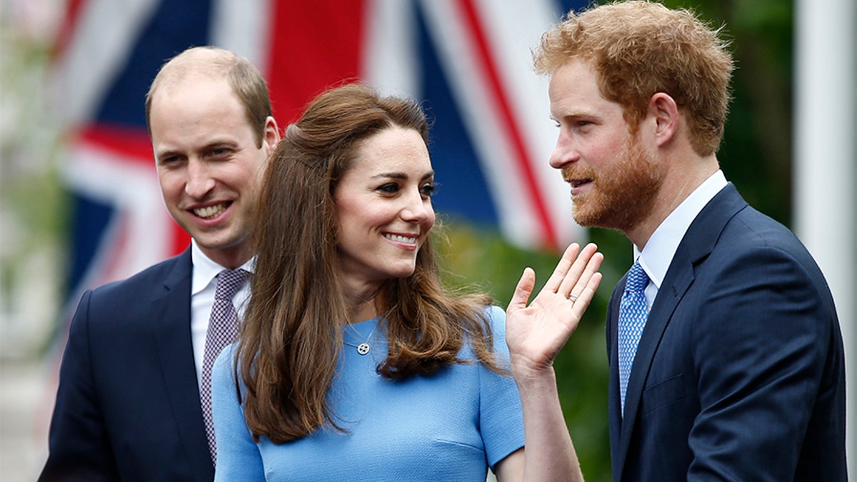 Kate Duchess of Cambridge, Prince William, and Prince Harry (R) greet guests attending the Patron's Lunch, an event to mark Britain's Queen Elizabeth's 90th birthday, in London, June 12, 2016. REUTERS/Peter Nicholls  - LR1EC6C153A5D