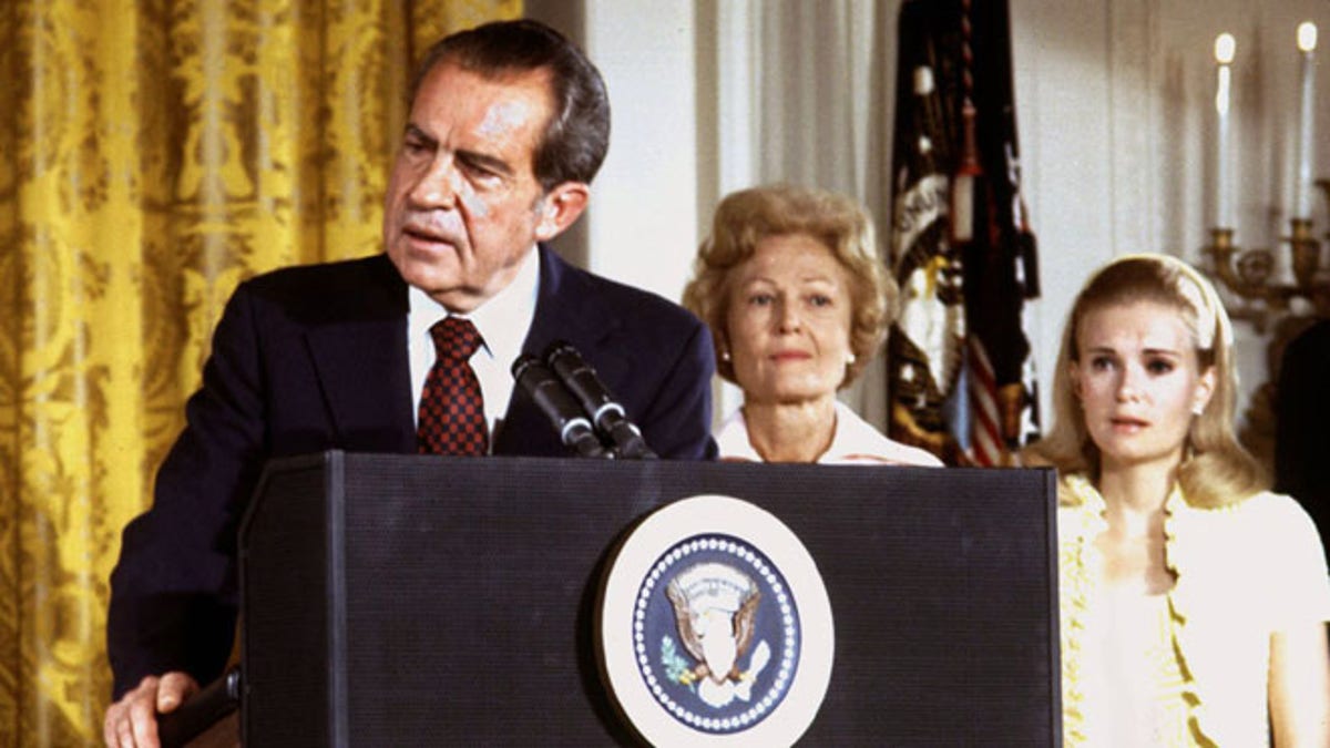 Former President Richard Nixon speaks at a podium