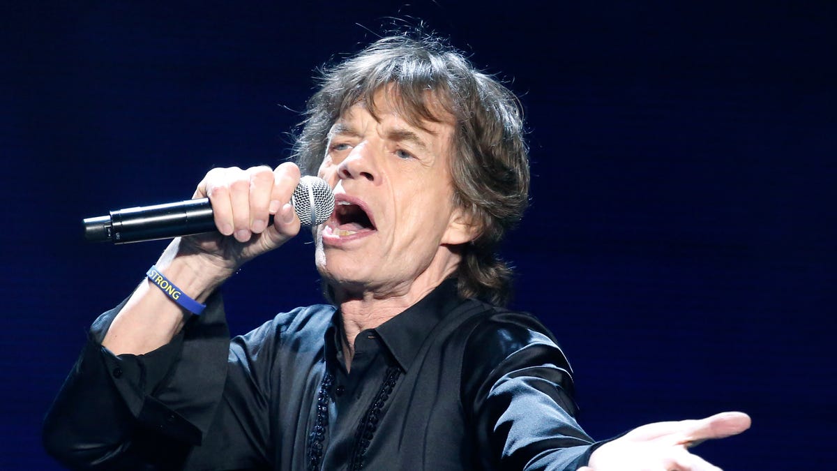 Mick Jagger of the Rolling Stones performs in concert at the TD Garden arena on Wednesday, June 12, 2013 in Boston. (Photo by Bizuayehu Tesfaye/Invision/AP)