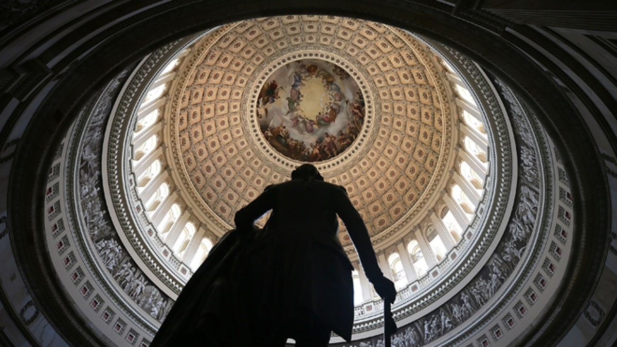 WASHINGTON, DC - AUGUST 28: A statue of George Washington stands in the Rotunda of the U.S. Capitol August 28, 2012 on Capitol Hill in Washington, DC. It has been reported that the dome of the Capitol has 1,300 known cracks and breaks leaking water to the interior of the Rotunda and needs restorations. The Senate Appropriations Committee has approved $61 million before the August recess to repair the structure. On Monday, Committee on Rules and Administration chairman Sen. Charles Schumer (D-NY) called on Speaker of the House Rep. John Boehner (R-OH) to support the repairs. (Photo by Alex Wong/Getty Images)