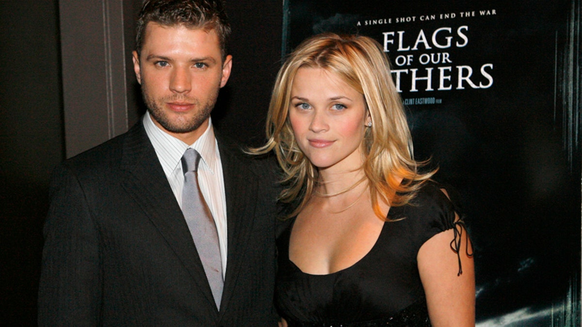 Actors Ryan Phillippe and Reese Witherspoon arrive at the premiere of 'Flags of Our Fathers' in New York October 16, 2006.