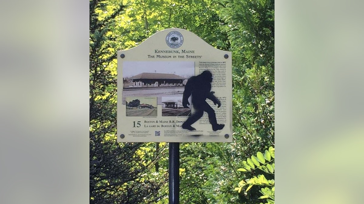 This Aug. 19, 2015 photo provided by the Kennebunk Police Department shows an graffiti on a sign in Kennebunk, Maine. Authorities have nabbed a man who's accused of spray-painting images of Sasquatch on public property in Kennebunk, Maine. Police in the picturesque coastal town didn't find the graffiti featuring Bigfoot all that amusing and charged 36-year-old Freeman Hatch with criminal mischief and possession of drugs. (Det. Stephen M. Borst, Kennebunk Police Department via AP)
