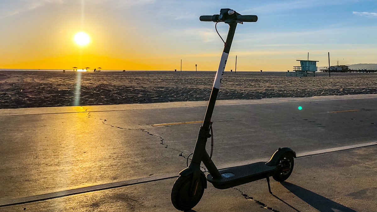 A Scooter Bird, now a popular transport in Santa Monica, is parked on Santa Monica Beach during sunset. iStock photo