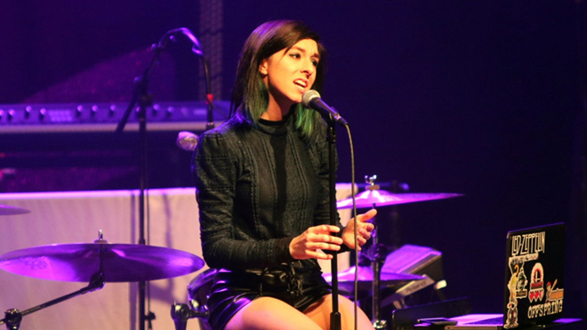 FILE - In this March 2, 2016 file photo, Christina Grimmie performs as the opener for Rachel Platten at Center Stage Theater, in Atlanta. Florida authorities say 