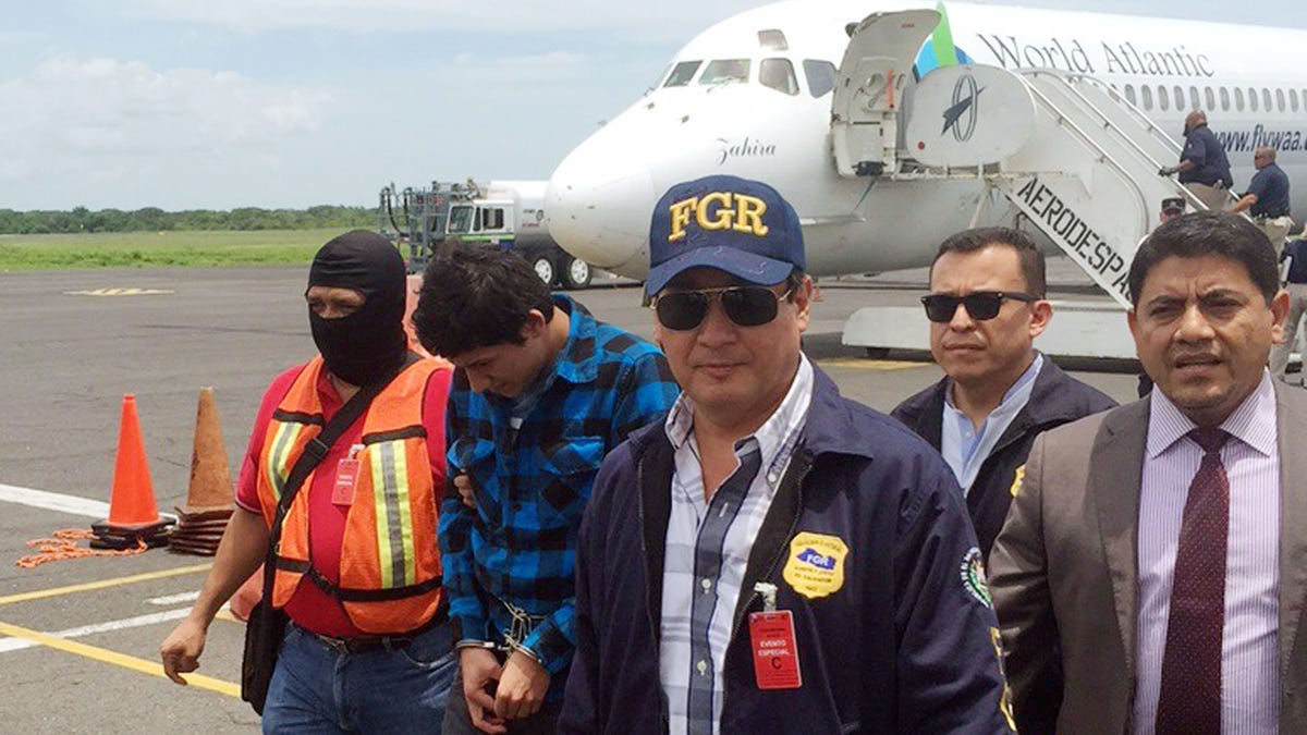 Slaying Suspect Deported