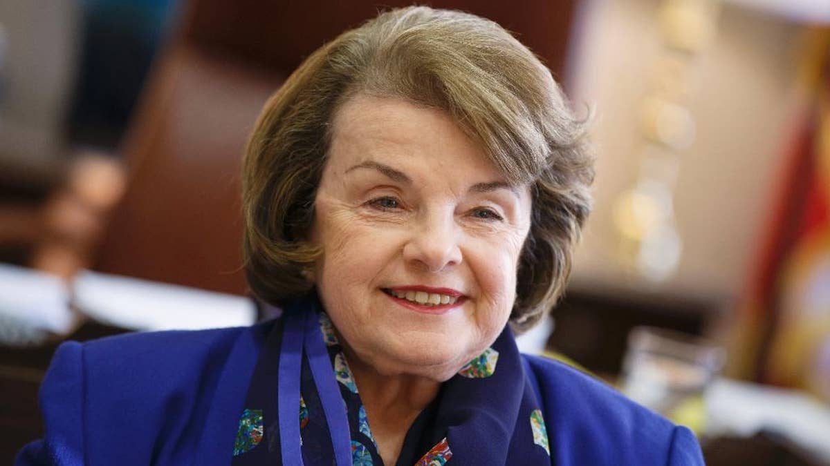 FILE - In this Feb. 11, 2015, file photo, Sen. Dianne Feinstein, D-Calif., speaks during an interview with The Associated about the CIA torture report, in her Capitol Hill office in Washington. Social media giants including Twitter, Yahoo, Facebook and Google are pushing back against Senate legislation that would require them to alert federal authorities of any terrorist activity. The Senate Intelligence Committee has included the requirement in a broader intelligence bill. The House didn’t include a similar provision in its bill. (AP Photo/J. Scott Applewhite, File)