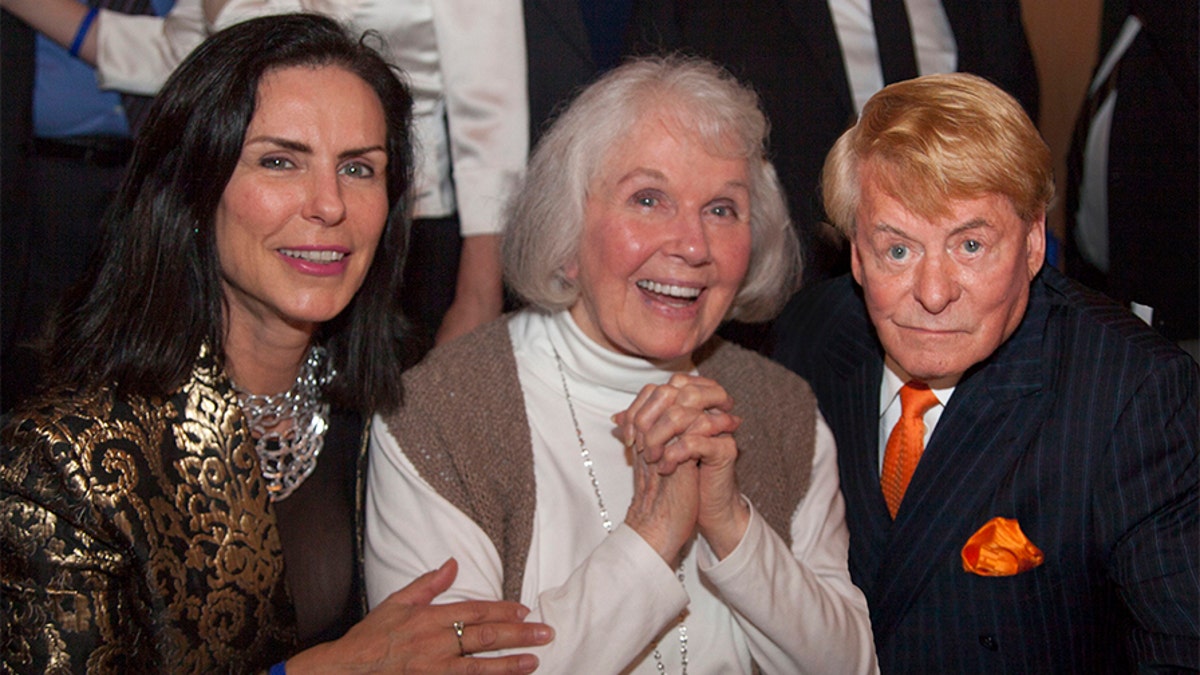 Doris Day makes a surprise appearance at her 90th birthday party in Carmel, California. The screen icon, who was making her first public appearance in two decades, posed for photos with her fans at the event at Carmel's Quail Lodge on April 4, 2014. Doris had not been expected to attend the party - a fundraiser for the Doris Day Animal Foundation - and guests gasped as she entered the room. Peter Marshall compered the event and 175 guests were treated to video highlights of Doris's lengthy career. Mr. Marshall and singer Sue Raney also performed a number of Doris Day songs. The event raised more than $90,000 for Doris's charity, www.dorisdayanimalfoundation.orgPictured: Jeanne Cox LeVett, Doris Day and Denny LeVettRef: SPL735576 090414 Picture by: 65 Degrees/Manny Espinoza/SplashSplash News and PicturesLos Angeles: 310-821-2666New York: 212-619-2666London: 870-934-2666photodesk@splashnews.com