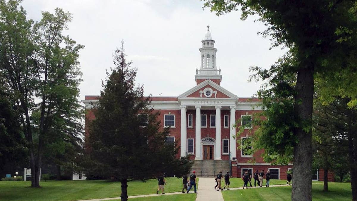 In this July 9, 2015 photo, members of the Vermont Geographic Alliance walk across campus at Castleton State College in Castleton, Vt., where they are attending a summer institute. The college seeks to change its name to Castleton University to reflect its growth in graduate programs and to attract more out-of-state and foreign students. (AP Photo/Lisa Rathke)