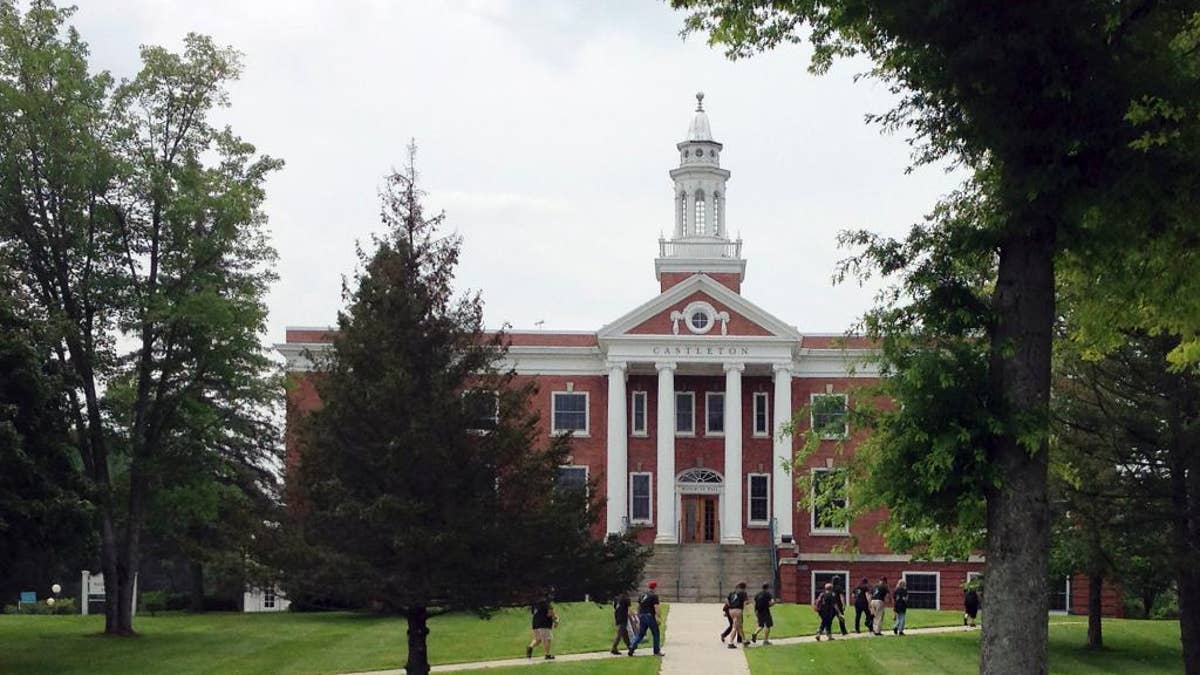 In this July 9, 2015 photo, members of the Vermont Geographic Alliance walk across campus at Castleton State College in Castleton, Vt., where they are attending a summer institute. The college seeks to change its name to Castleton University to reflect its growth in graduate programs and to attract more out-of-state and foreign students. (AP Photo/Lisa Rathke)