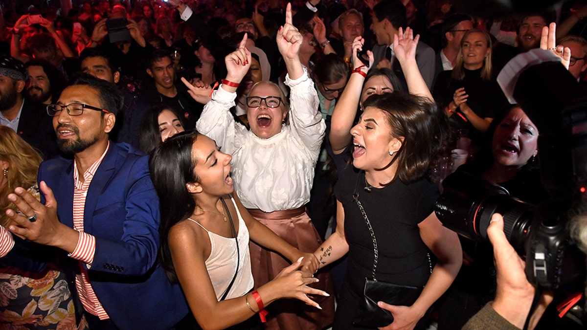 Supporters attend the Social Democratic Party's election night party in Stockholm, Sweden, Sunday, Sept. 9, 2018. Claudio Bresciani/TT via AP