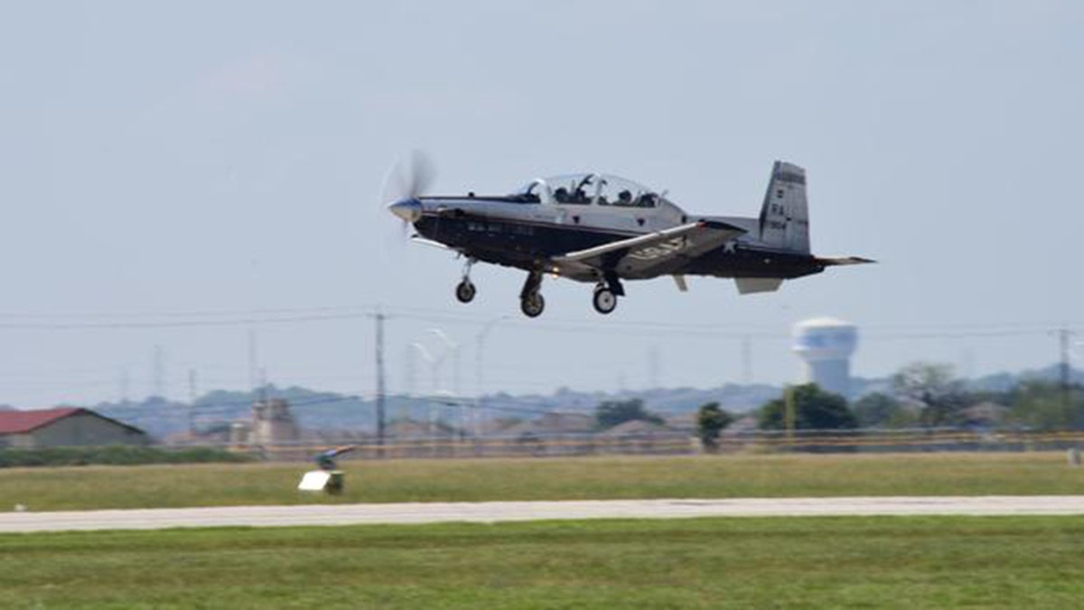 A t-6 A Texan ii Takes off. OCt 12 photo US AIR FORCE by Randy Martin