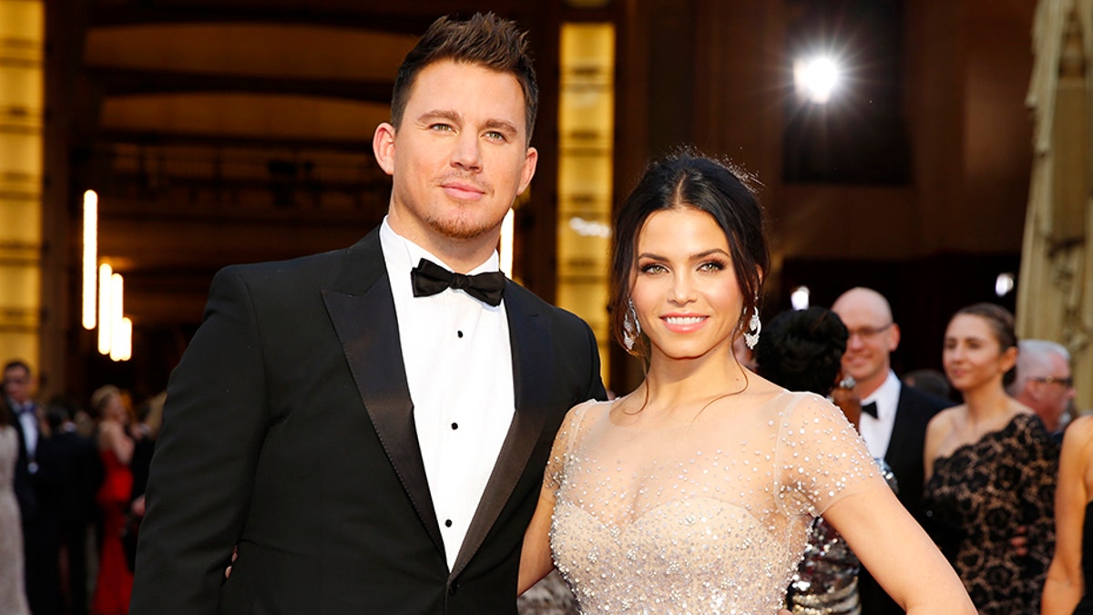 Presenter Channing Tatum and his wife Jenna Dewan arrive on the red carpet at the 86th Academy Awards in Hollywood, California March 2, 2014.  REUTERS/Mike Blake (UNITED STATES TAGS: ENTERTAINMENT) (OSCARS-ARRIVALS) - TB3EA33044F3G