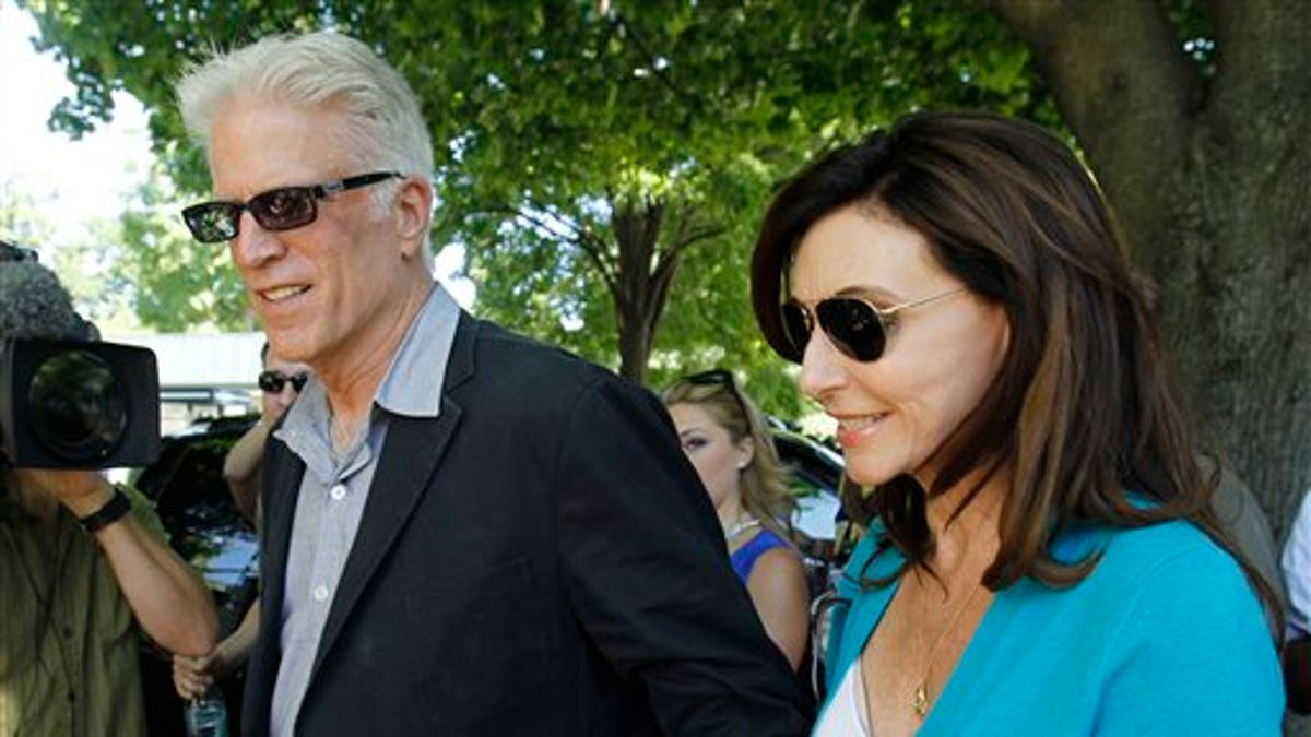Actor Ted Danson and wife Mary Steenburgen arrive at the Delamater Inn in Rhinebeck, N.Y., on Saturday, July 31, 2010.  Chelsea Clinton and fiance Marc Mezvinsky are expected to be married in Rhinebeck today. (AP Photo/Mike Groll)