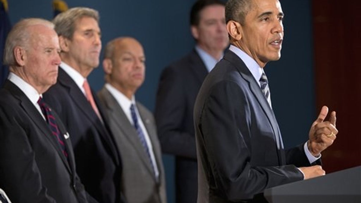 President Barack Obama speaks at the National Counterterrorism Center in McLean, Va.,Thursday, Dec. 17, 2015. Joining him, from left are,, Vice President Joe Biden, Secretary of State John Kerry, Homeland Security Secretary Jeh Johnson, and FBI Director James Comey. The president said U.S. intelligence and counter-terrorism professionals dont have any specific, credible information suggesting a terrorist attack on the U.S. during the holidays. (AP Photo/Pablo Martinez Monsivais)