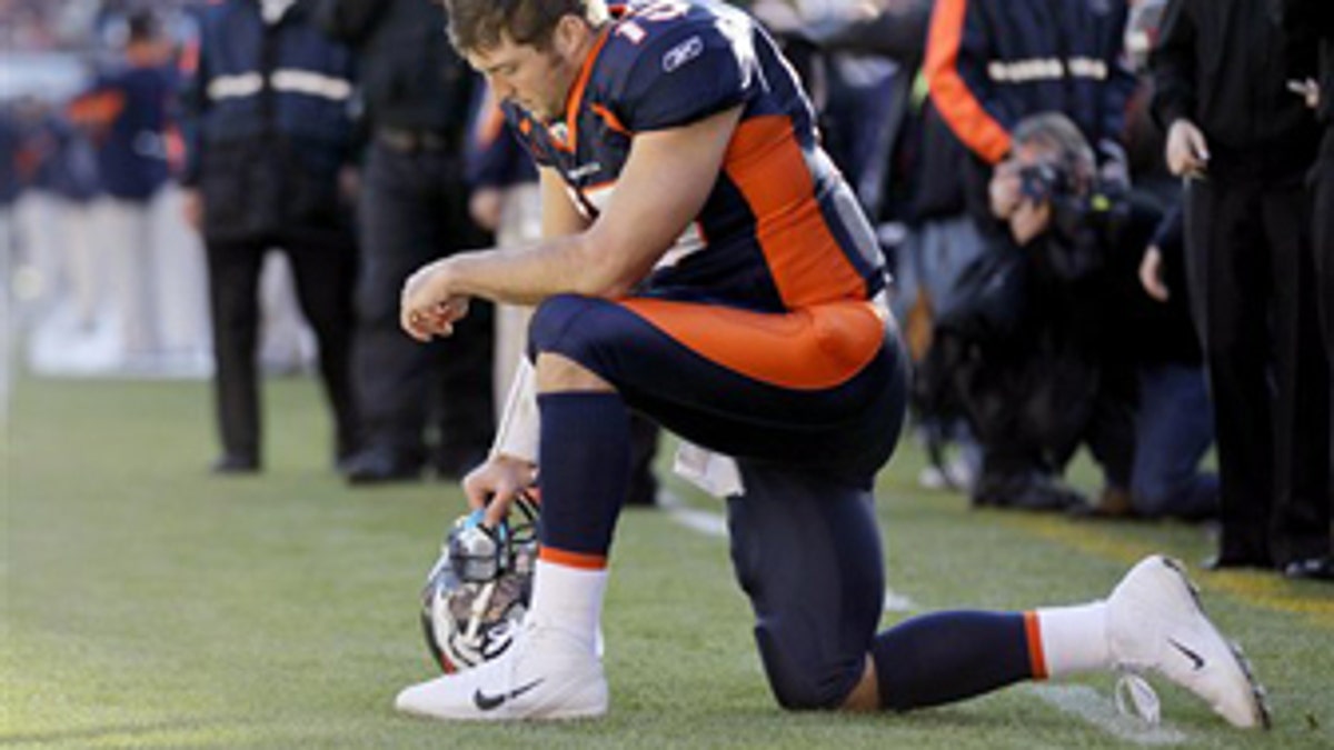 Tim Tebow, a former NFL quarterback who now plays for the Mets, responded to critics who said used his "Tebowing" photo to support national anthem protests.