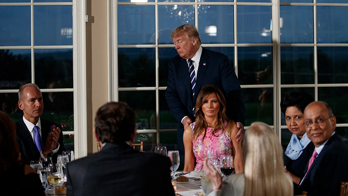 President Donald Trump speaks at a dinner meeting with business leaders, Tuesday, Aug. 7, 2018, at Trump National Golf Club in Bedminster, N.J.