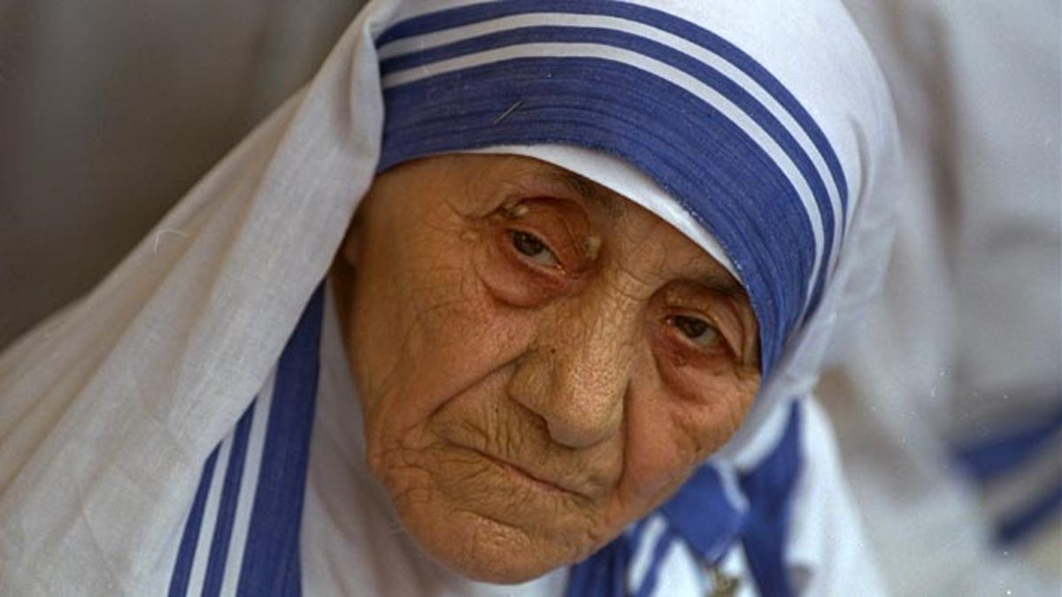 FILE - In this Aug. 25, 1993 file photo Mother Teresa, head of Missionaries of Charity, is photographed, in New Delhi,  India. Pope Francis has signed off on the miracle needed to make Mother Teresa a saint, giving the nun who cared for the poorest of the poor one of the Catholic Church's highest honors just two decades after her death. The Vatican said Friday, Dec. 18, 2015, that Francis approved a decree attributing a miracle to Mother Teresa's intercession during an audience with the head of the Vatican's saint-making office on Thursday, his 79th birthday. (AP Photo, file)