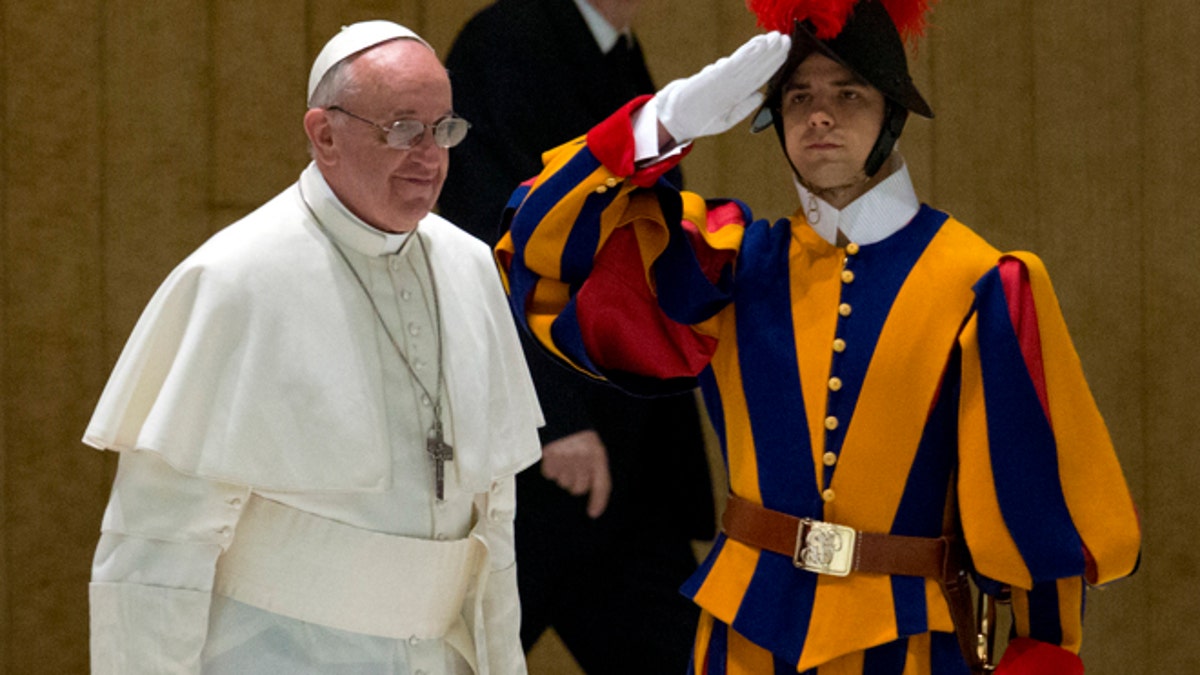 Pope Francis and a guard