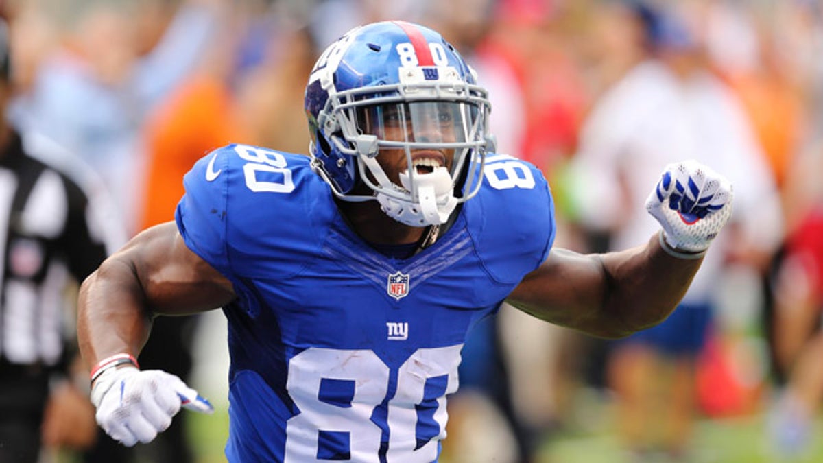 New York Giants wide receiver Victor Cruz (80) celebrates after making a catch during the second half of an NFL football game against the New Orleans Saints, Sunday, Sept. 18, 2016, in East Rutherford, N.J. (AP Photo/Seth Wenig)