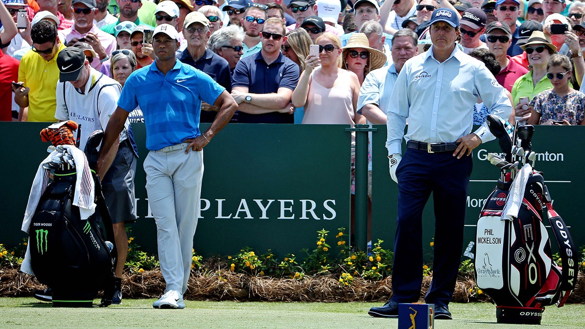 May 10, 2018; Ponte Vedra Beach, FL, USA; Tiger Woods and Phil Mickelson on the first tee during the first round of The Players Championship golf tournament at TPC Sawgrass - Stadium Course. Mandatory Credit: Peter Casey-USA TODAY Sports - 10828079