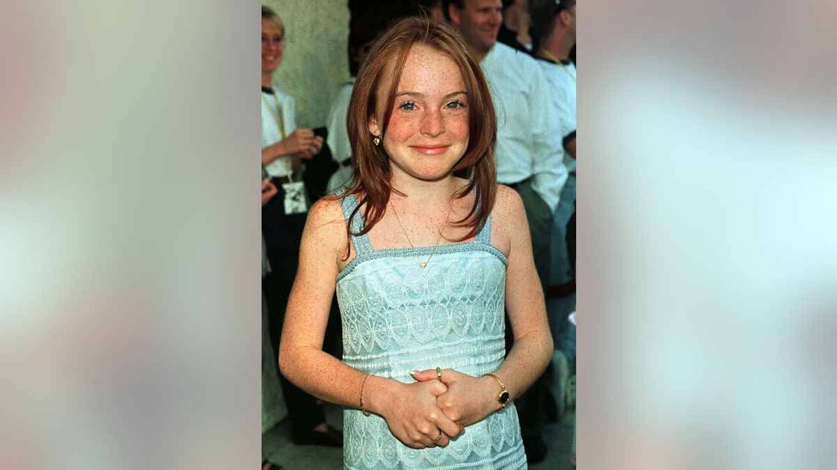 Actress Lindsay Lohan, one of the stars in the new romantic comedy film "The Parent Trap" poses at the film's premiere July 20 in Los Angeles. The film, which also stars Natasha Richardson and Dennis Quaid, is a re-make of the classic Disney film and opens in the United States July 29.FSP/RC