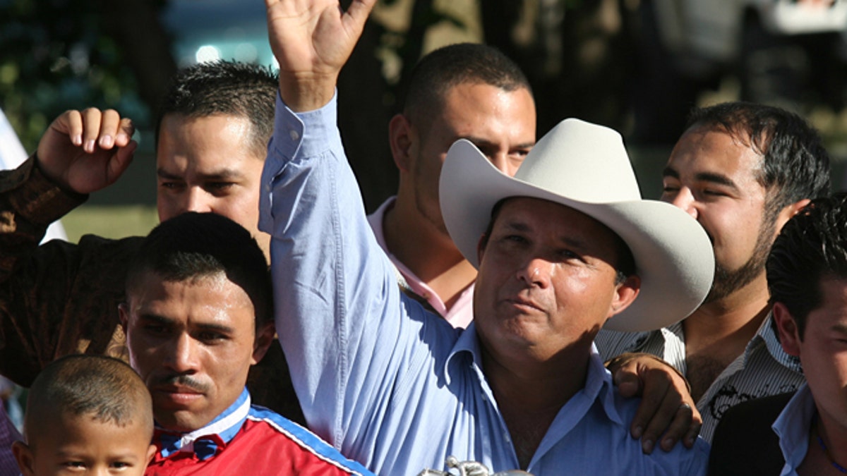 3c010366-Drug Raid Horse Track