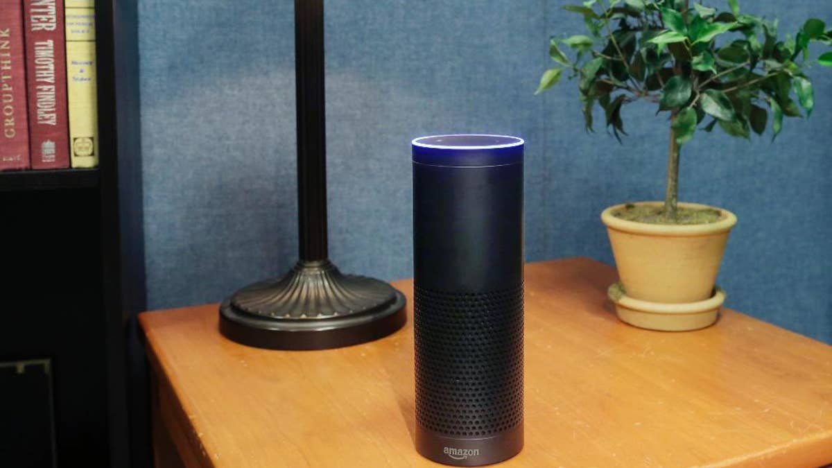 FILE - This July 29, 2015, file photo made in New York shows Amazon's Echo, a digital assistant that continually listens for commands such as for a song, a sports score or the weather. Starting Thursday, March 17, 2016, Amazon’s voice assistant will tell you how well you slept and how much more exercise you need, at least if you have a Fitbit fitness tracker and an Alexa-compatible device, such as Amazon’s Echo speaker and Fire TV streaming devices. (AP Photo/Mark Lennihan, File)