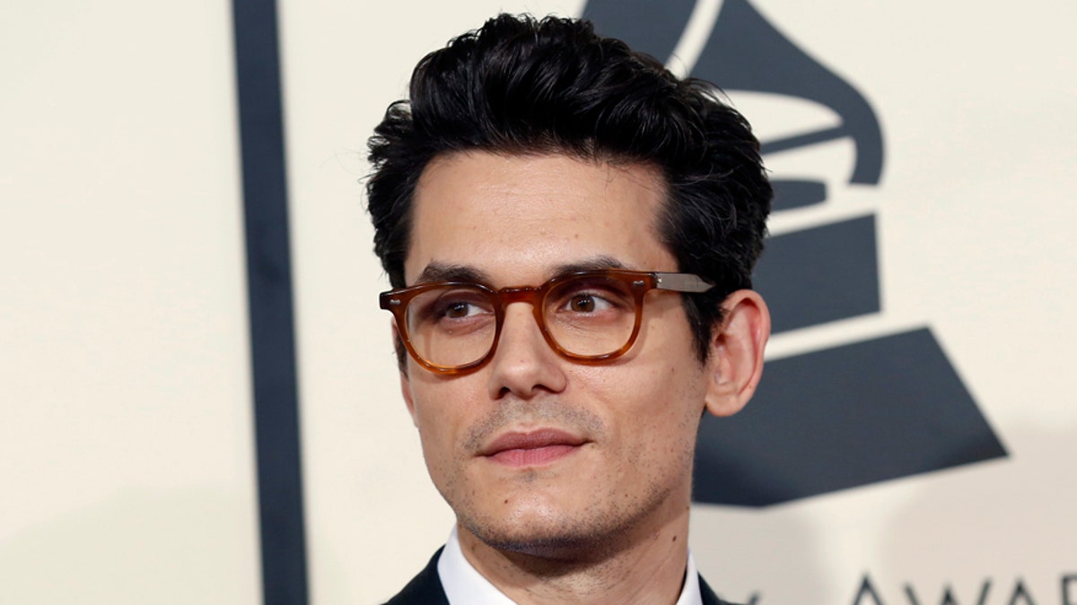 Singer John Mayer arrives at the 57th annual Grammy Awards in Los Angeles, California February 8, 2015. REUTERS/Mario Anzuoni (UNITED STATES - Tags: ENTERTAINMENT) (GRAMMYS-ARRIVALS) - RTR4OQMB