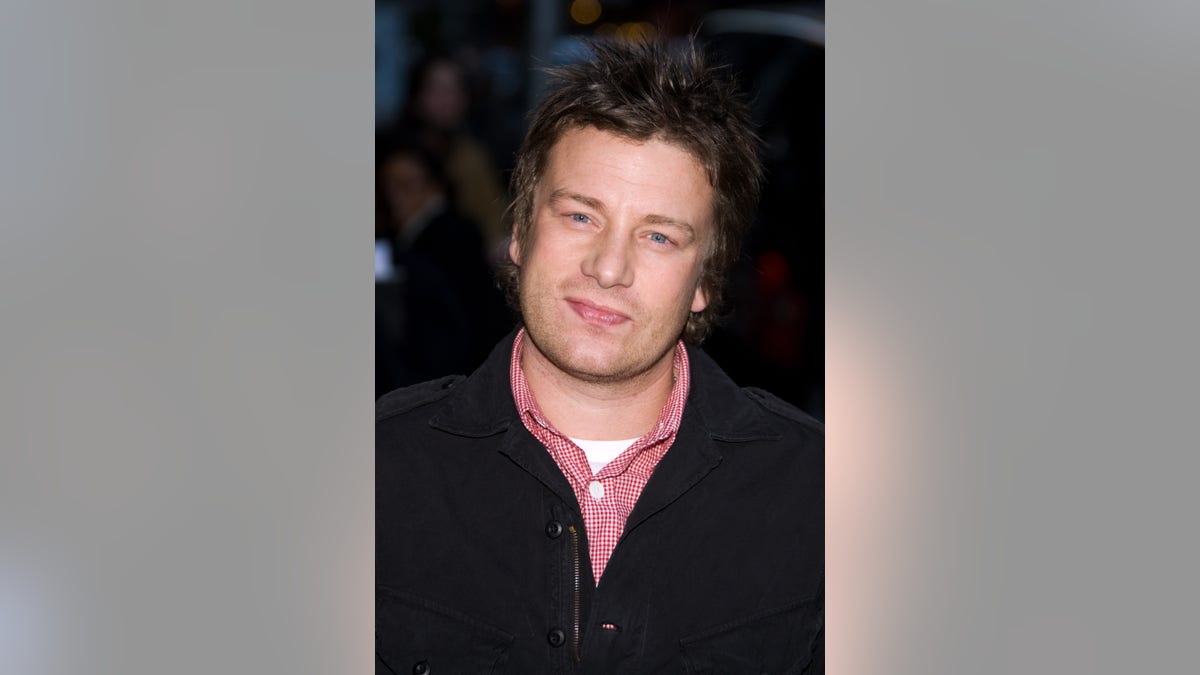 File - Chef Jamie Oliver arrives for a taping of the 
