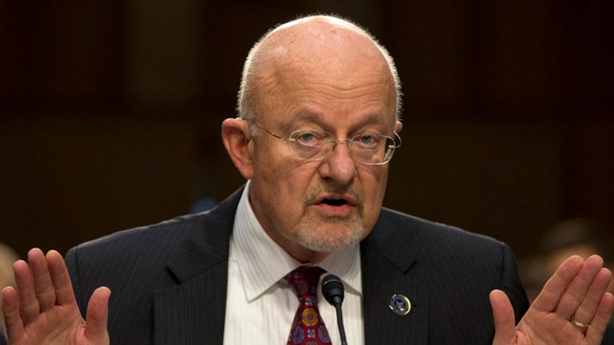 FILE: Sept. 26, 2013: Director of National Intelligence James Clapper testifies on Capitol Hill in Washington.