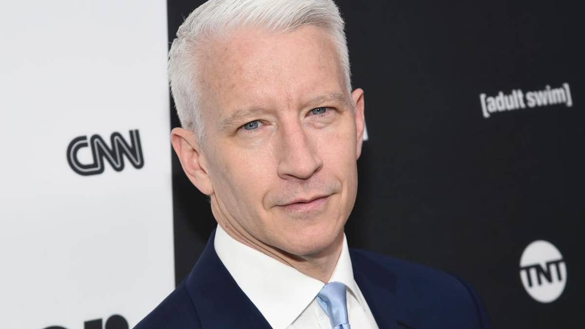 FILE - In this May 18, 2016 file photo, CNN news anchor Anderson Cooper attends the Turner Network 2016 Upfronts in New York. Cooper signed a long-term deal to stay with CNN, a person with knowledge of the agreement said Tuesday, Oct. 4. His decision may put an end to the possibility he'll join Kelly Ripa as co-host of ABC's 