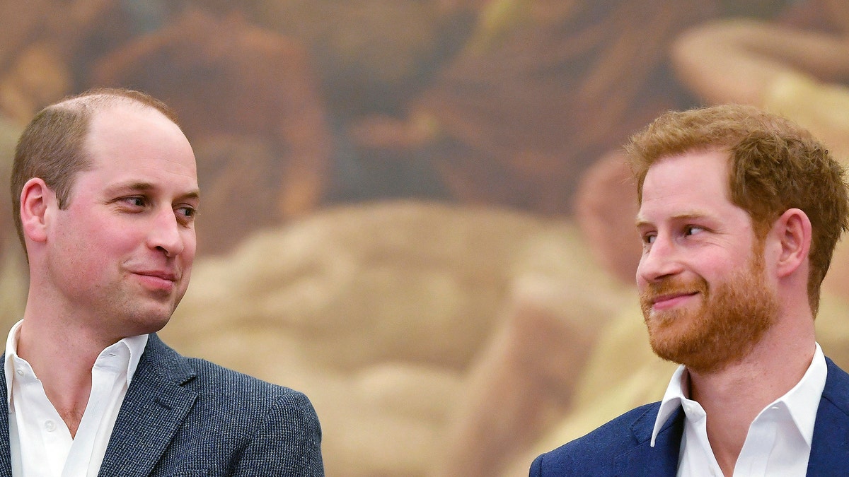 Britain's Prince William, left, and Prince Harry attend the opening the Greenhouse Centre in London, Thursday, April 26, 2018. The center will provide sport, coaching and social facilities for young people in the surrounding Marylebone community. (Toby Melville/PA via AP)