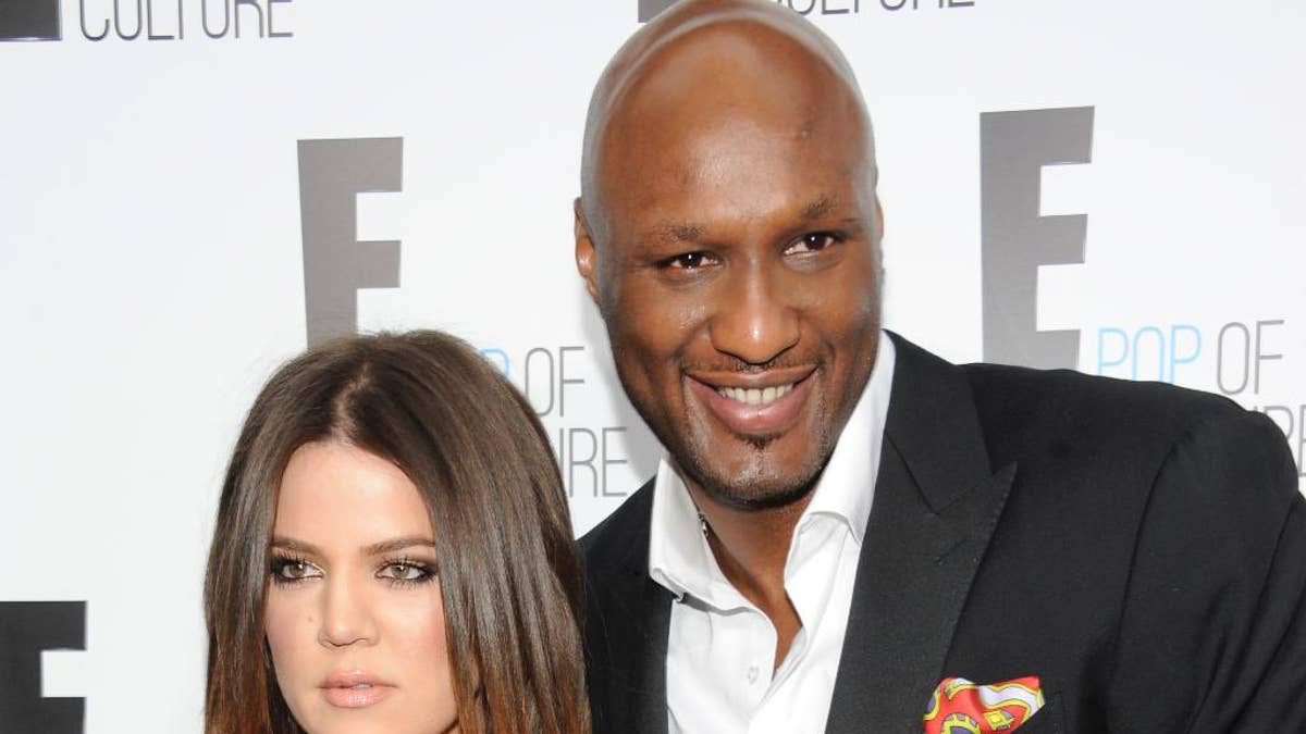 FILE - In this April 30, 2012, file photo, Khloe Kardashian Odom and Lamar Odom from the show 