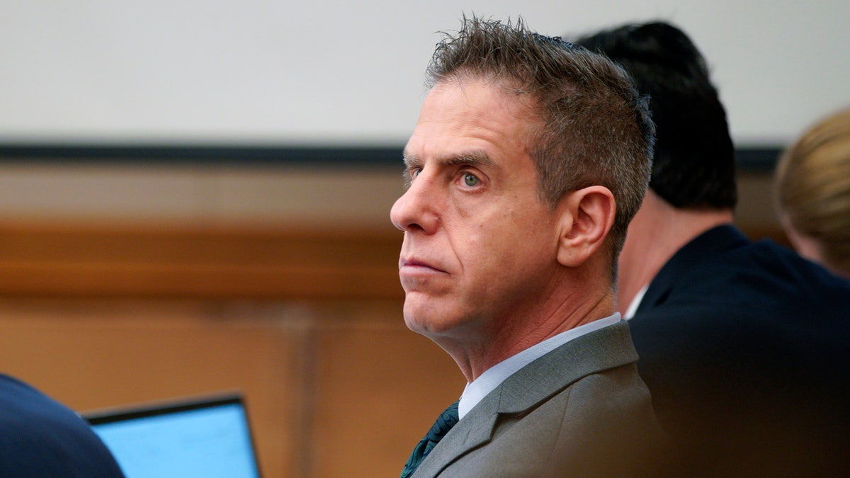 FILE - In this Feb. 28, 2018 file photo Adam Shacknai sits in court during the civil trial, in San Diego for the wrongful death of Rebecca Zahau. A civil jury has determined Shacknai, is legally responsible for the death of Zahau, found hanged at a San Diego-area mansion. Jurors in the wrongful death trial decided Wednesday, April 4, 2018, that Shacknai must pay Rebecca Zahau's family $5 million for the loss of Zahau's love and companionship. (Nelvin C. Cepeda/The San Diego Union-Tribune via AP)   /The San Diego Union-Tribune via AP)