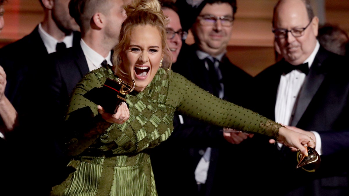 adele breaks grammy ap