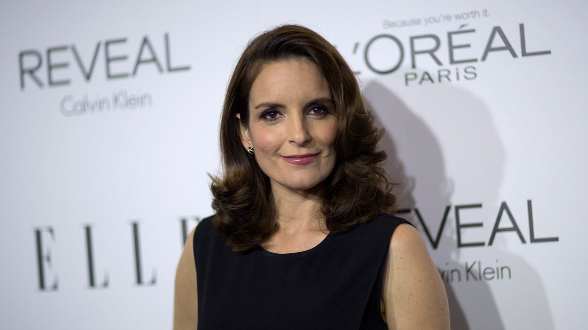 October 20, 2014. Actress and honoree Tina Fey poses at the 21st annual ELLE Women in Hollywood Awards in Los Angeles.