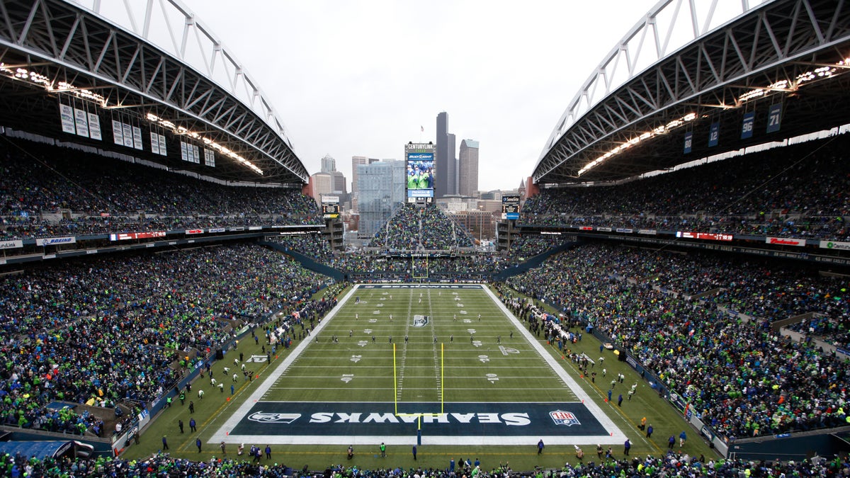 Jan. 11, 2014: Fans at CenturyLink Field watch during the first quarter of an NFC divisional playoff NFL football game between the Seattle Seahawks and the New Orleans Saints in Seattle.