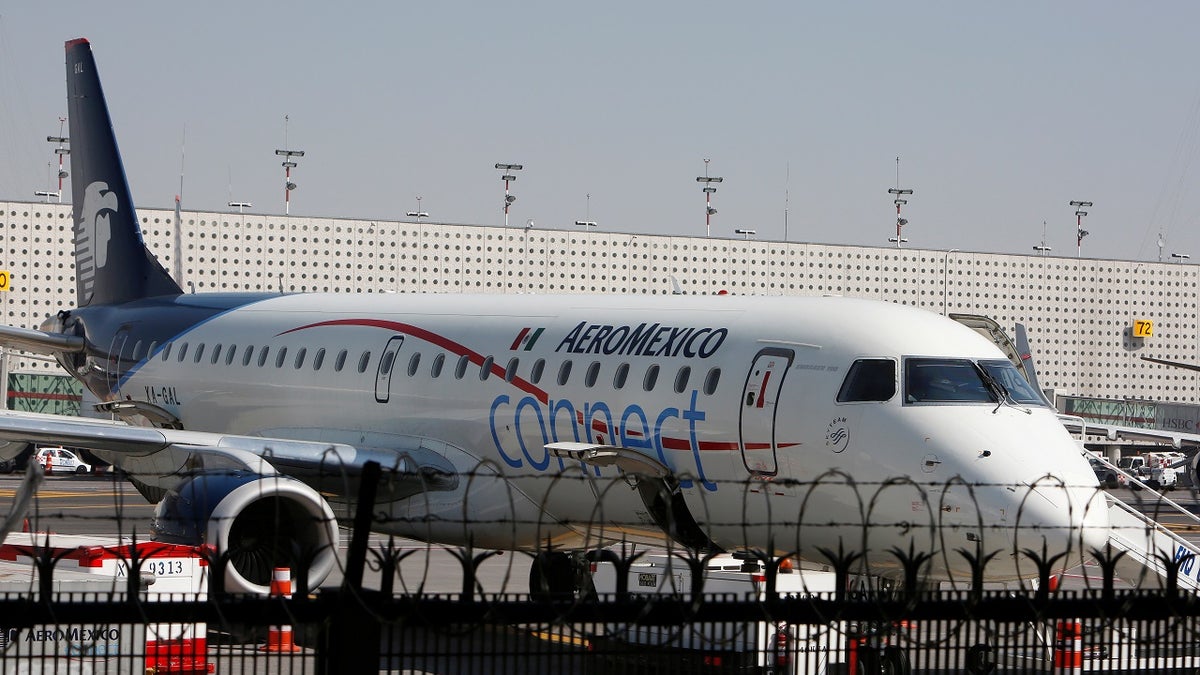 An aeroplane of Aeromexico Connect, regional operator of Mexico's largest airline Aeromexico, is pictured at the airstrip at Benito Juarez international airport in Mexico City, Mexico, November 28, 2017. REUTERS/Ginnette Riquelme - RC1DD742A500