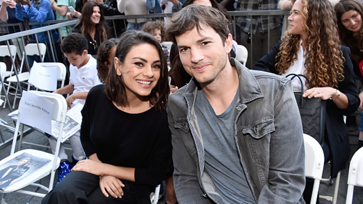 HOLLYWOOD, CA - MAY 03: Actors Mila Kunis (L) and Ashton Kutcher at the Zoe Saldana Walk Of Fame Star Ceremony on May 3, 2018 in Hollywood, California. (Photo by Alberto E. Rodriguez/Getty Images for Disney)
