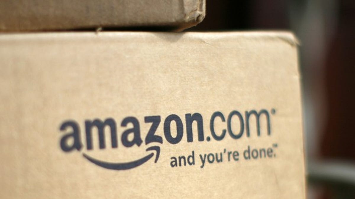 A box from Amazon.com is pictured on the porch of a house in Golden, Colorado in this July 23, 2008 file photograph. 