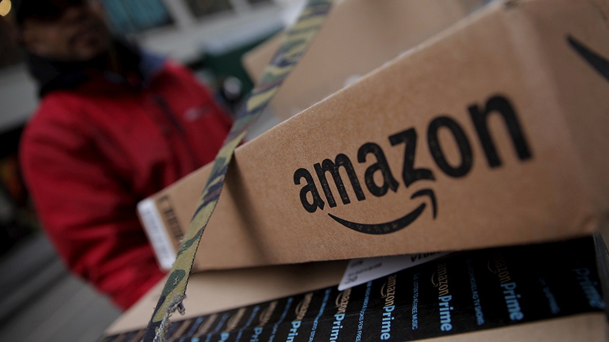 FILE PHOTO: Amazon boxes are seen stacked for delivery in the Manhattan borough of New York City, January 29, 2016. REUTERS/Mike Segar/File Photo - RC1FF7A72B20