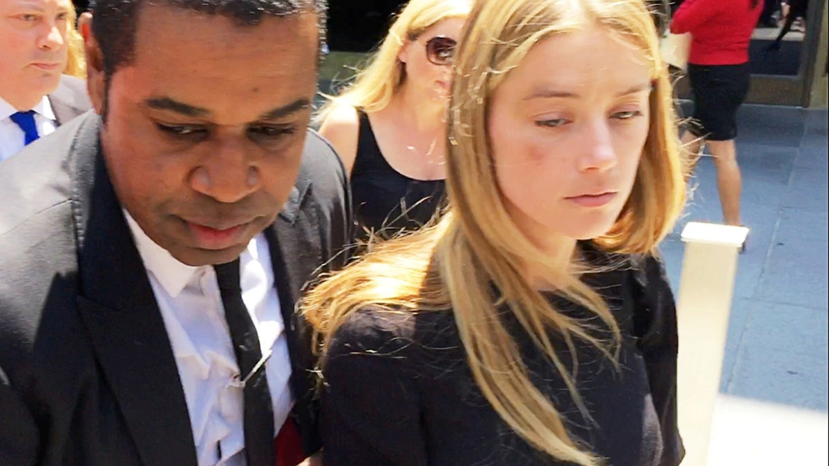 Actress Amber Heard leaves the Superior Court of Los Angeles in Los Angeles, California, U.S. May 27, 2016, with what appears to be a bruise on her right cheek after obtaining a restraining order against husband Johnny Depp in this still image from video. REUTERS/Rollo Ross TPX IMAGES OF THE DAY - S1BETGNKADAA