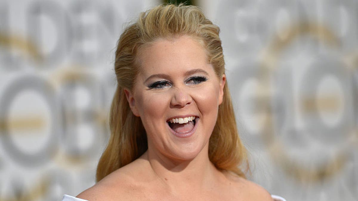 LOS ANGELES, CA - JANUARY 10: Amy Schumer arrives at 73rd Annual Golden Globe Awards event on January 10, 2016 in Los Angeles, California.PHOTOGRAPH BY Barcroft MediaUK Office, London.T +44 845 370 2233W www.barcroftmedia.comUSA Office, New York City.T +1 212 796 2458W www.barcroftusa.comIndian Office, Delhi.T +91 11 4053 2429W www.barcroftindia.com (Photo credit should read Barcroft Media / Barcroft Media via Getty Images)