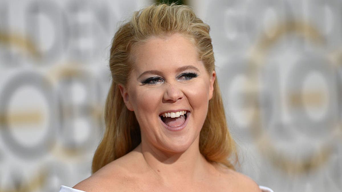 LOS ANGELES, CA - JANUARY 10: Amy Schumer arrives at 73rd Annual Golden Globe Awards event on January 10, 2016 in Los Angeles, California.PHOTOGRAPH BY Barcroft MediaUK Office, London.T +44 845 370 2233W www.barcroftmedia.comUSA Office, New York City.T +1 212 796 2458W www.barcroftusa.comIndian Office, Delhi.T +91 11 4053 2429W www.barcroftindia.com (Photo credit should read Barcroft Media / Barcroft Media via Getty Images)